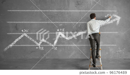 Businessman and statistics trend 96176489