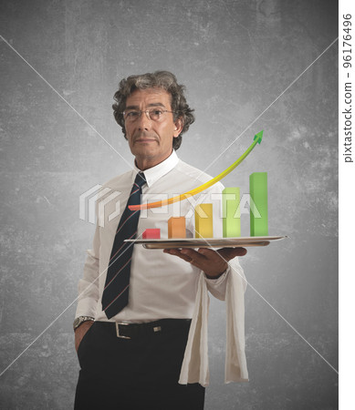 Businessman and positive statistics Businessman and positive statistics 96176496