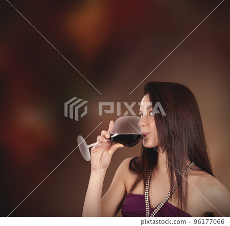 Girl drinking wine 96177066