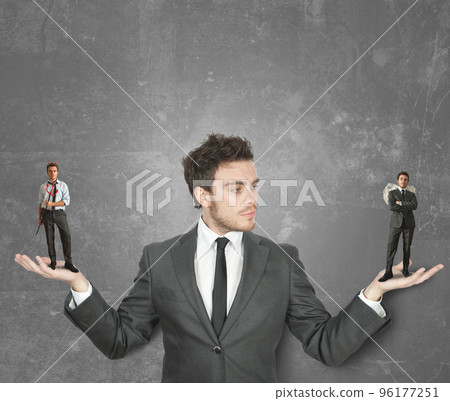 Businessman with devil or angel 96177251