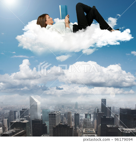 Businesswoman reading book Businesswoman reading book 96179094