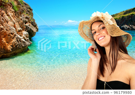 Brunette girl on the beach 96179980