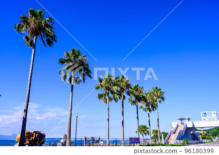 Scenery around Amakusa Ariake Octopus Highway in the background of a beautiful summer sky "Michi-no-Eki Ariake (Ripple Land)" tourist attraction 96180399