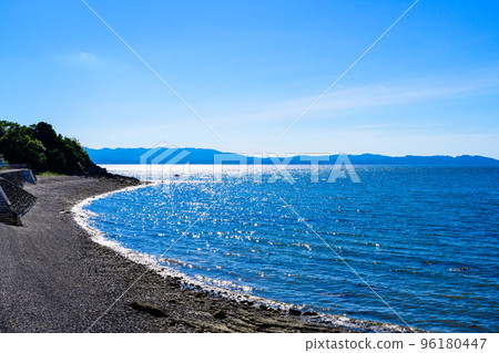 Scenery around Amakusa Ariake Octopus Highway in the background of a beautiful summer sky "Michi-no-Eki Ariake (Ripple Land)" tourist attraction 96180447