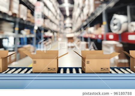 Cardboard boxes on conveyor rollers inside a warehouse ready to be shipped by courier for distribution 96180788