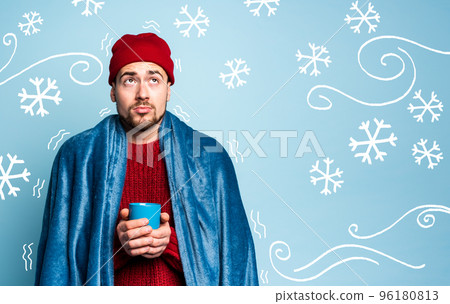 Boy caught a cold and drinks hot the. Cyan background. Concept of illness 96180813