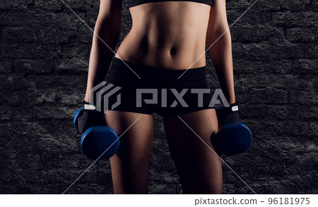 Determinated girl at the gym ready to start fitness lesson 96181975