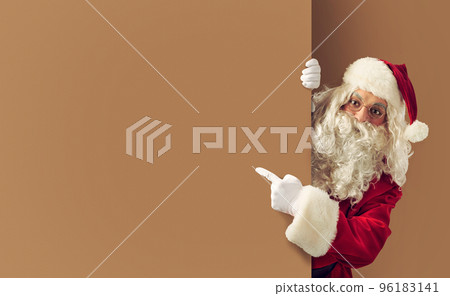Santa claus indicates a blank space for your text Santa claus indicates a blank space for your text 96183141