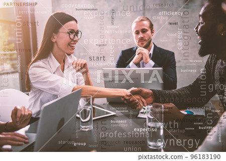 Team of people work together. concept of teamwork and partnership. Most important business terms in overlay Team of people work together. concept of teamwork and partnership. Most important business terms in overlay 96183190
