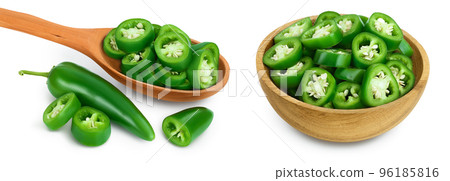 sliced jalapeno pepper in wooden spoon and bowl isolated on white background. Green chili pepper with full depth of field. 96185816