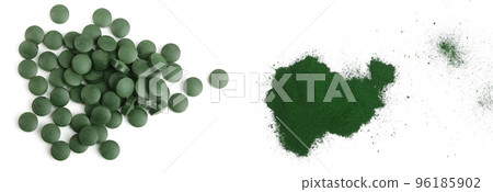 Spirulina algae powder and pills isolated on white background. Top view Spirulina algae powder and pills isolated on white background. Top view 96185902