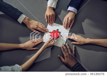 Teamwork of partners. Concept of integration and startup with puzzle pieces 96186076