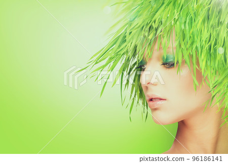 Nature beauty woman with fresh grass hair. Nature beauty woman with fresh grass hair. 96186141