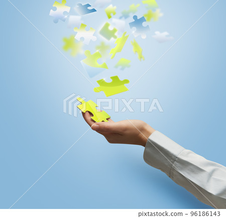 girl-holds-a-puzzle-piece-of-nature-stock-photo-96186143-pixta