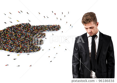 Crowd of people united forming a hand pointing a sad man. 3D Rendering Crowd of people united forming a hand pointing a sad man. 3D Rendering 96186838