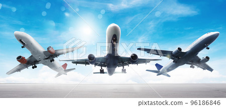 Summer holiday and traveling concept with aircrafts in the sky 96186846