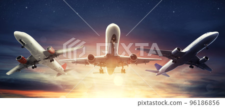Summer holiday and traveling concept with aircrafts in the sky 96186856