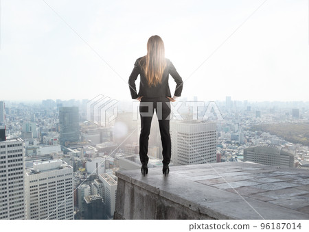 Businesswoman looking to the future for new business opportunity. 96187014