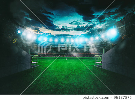 Soccer stadium seen by the exit of the locker room tunnel 96187875