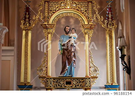 Saint Joseph hold Infant Jesus statue at Cathedral church, Chanthaburi 96188154