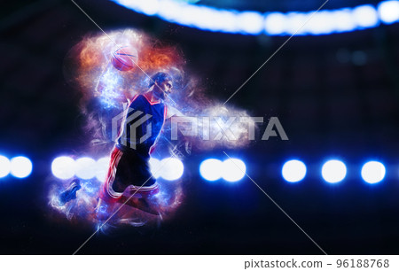 Acrobatic slam dunk of a basket player in the basket at the stadium 96188768