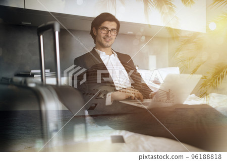 Traveler businessman with his laptop ready for the cruise ship vacation . Double exposure 96188818