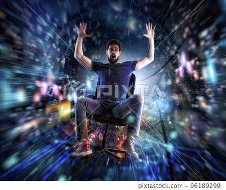 Man on a office chair go fast in a internet cable. Concept of fast internet and network connection Man on a office chair go fast in a internet cable. Concept of fast internet and network connection 96189299