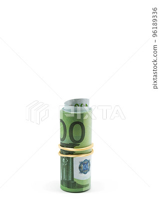 Rolled up one hundred euro bills on white. Roll of Europe paper currency. Rolled up one hundred euro bills on white. Roll of Europe paper currency. 96189336
