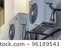 office air conditioners on the wall of the building 96189541
