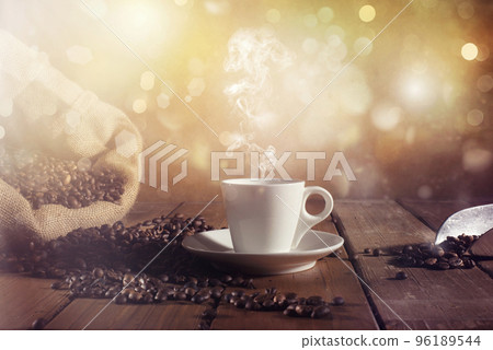 Background of a cup of coffee beans Background of a cup of coffee beans 96189544
