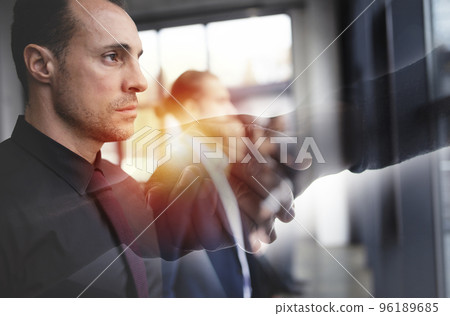 Handshaking business person in office. concept of teamwork and partnership. double exposure Handshaking business person in office. concept of teamwork and partnership. double exposure 96189685