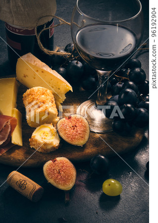 still life wine different cheeses and fruits still life wine different cheeses and fruits 96192904