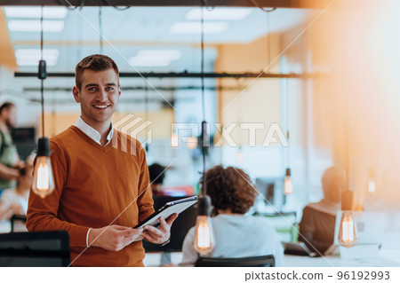 Photo portrait of a manager working in a modern company dealing with digital marketing Photo portrait of a manager working in a modern company dealing with digital marketing 96192993