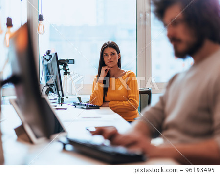 A young woman using a camera to present her business with online clients  96193495