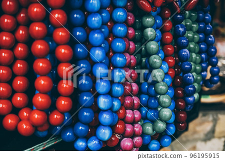 Wooden red beads on the market 96195915