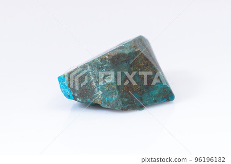 Natural Chrysocolla stone on a white background. Mineral of blue and bluish-green color on a white background Natural Chrysocolla stone on a white background. Mineral of blue and bluish-green color on a white background 96196182