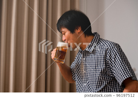 Middle man who drinks with beer Middle man who drinks with beer 96197512