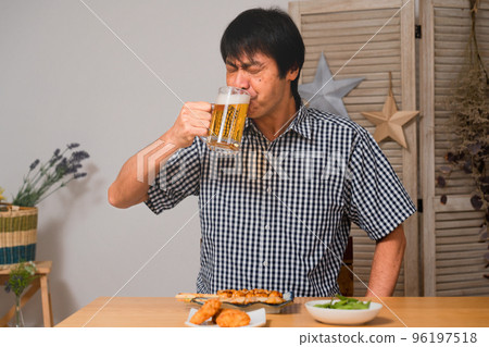 Middle man who drinks with beer 96197518