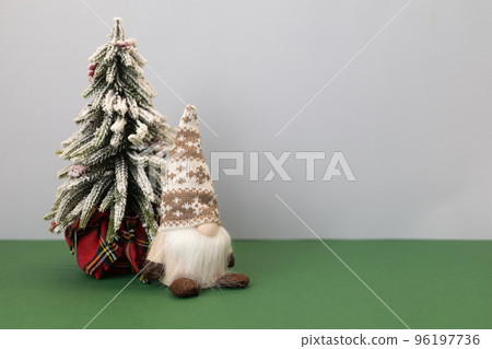 christmas tree and gnome gonk with copy space background christmas tree and gnome gonk with copy space background 96197736