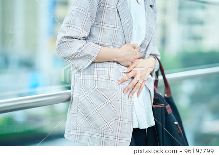 A woman who cares about her stomach 96197799