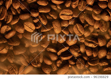 Texture of coffee beans, light soft light and steam from coffee. Texture of coffee beans, light soft light and steam from coffee. 96198829