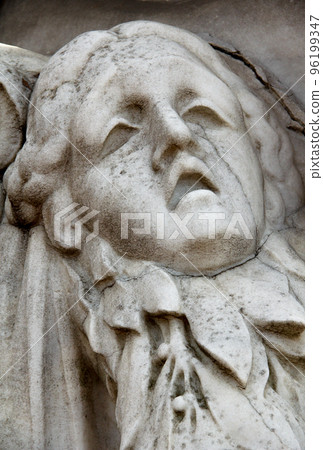 Statue of woman on tomb as a symbol of depression pain and sorrow 96199347