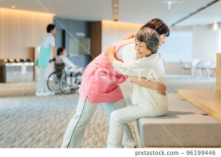 A young helper woman who takes care of the elderly at a nursing home Photography cooperation "LINK FOREST" 96199446