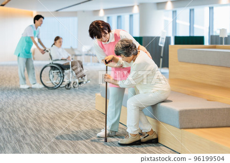 A young helper woman who takes care of the elderly at a nursing home Photography cooperation "LINK FOREST" 96199504
