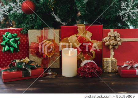 2023 Happy New Year, Christmas celebration with presents, pine tree, candle, ball decorations background. 2023 Happy New Year, Christmas celebration with presents, pine tree, candle, ball decorations background. 96199809