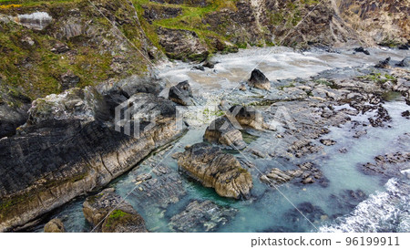 Large stones on the seashore, top view. The rocky coastline of southern Ireland. Beautiful nature of northern Europe. 96199911