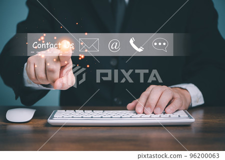 Contact us, Call center or Customer support hotline people connect, Businessman using a computer and touching on virtual screen contact , email, mail, live chat, telephone number icons. 96200063