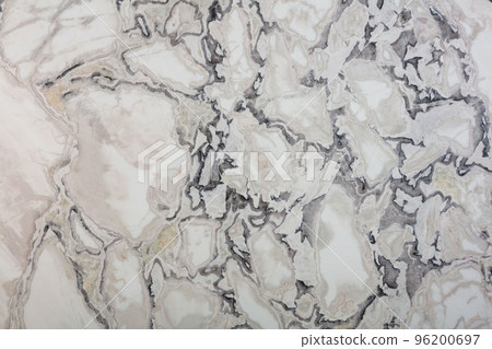 Dover White - natural polished marble stone texture, photo of slab. Soft clasic light matt Italian material pattern for exterior home decoration, floor and ceramic wall tiles surface. Stone wallpaper. Dover White - natural polished marble stone texture, photo of slab. Soft clasic light matt Italian material pattern for exterior home decoration, floor and ceramic wall tiles surface. Stone wallpaper. 96200697
