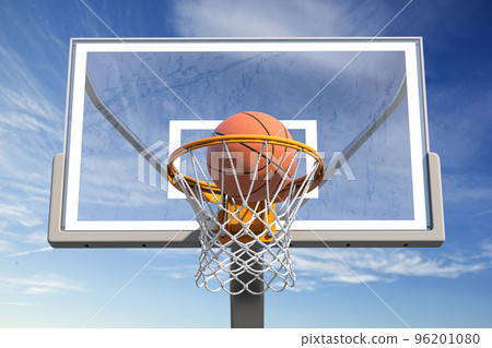 Basketball ball in tha basketball hoop on a street basketball court. 96201080