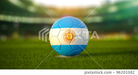 Football ball with flag of Argentina on the field of football stadium and space for name of football clubs. Football championship of Argentina concept. 96201082